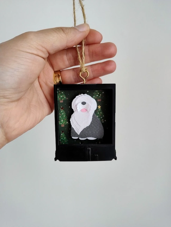 Vista detalle frontal adorno tipo Polaroid Go Bianca